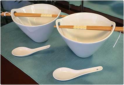 Soup Bowls With Chopsticks and Spoons